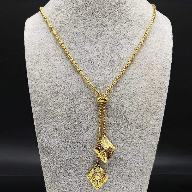 Long geometric necklace in gold-colored steel.