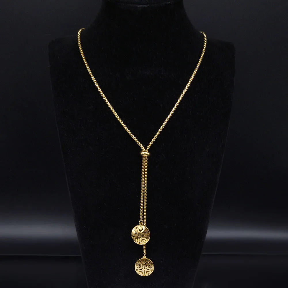 Long gold stainless steel necklace with heart detail.